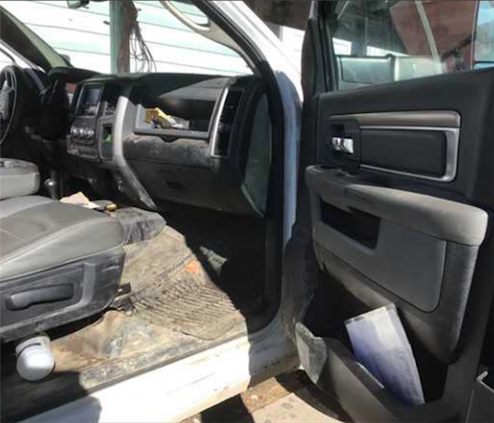 Black Interior of Truck with dirt