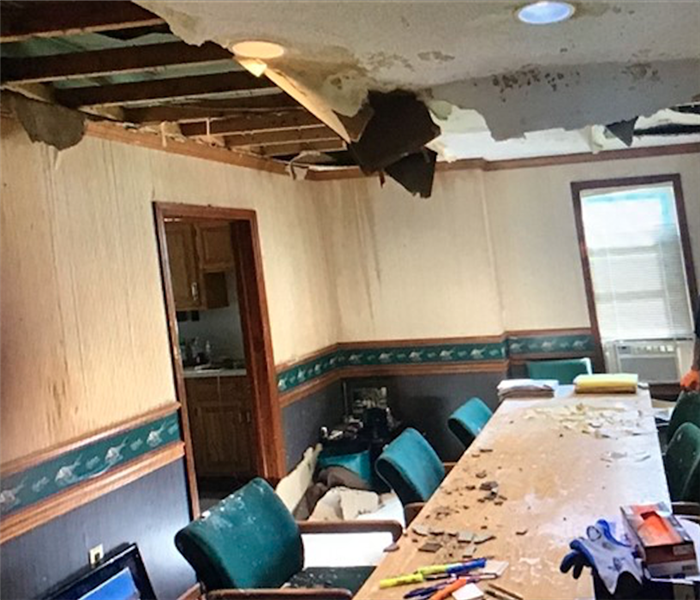 Water Damage to conference room of office, missing ceiling 