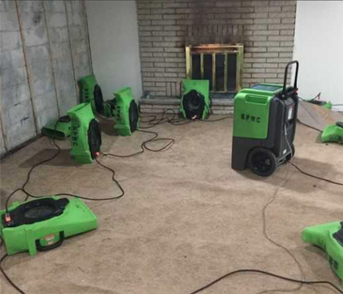 Green Servpro equipment in residential home
