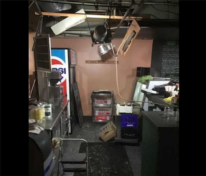 restaurant bar with water damage to ceiling 