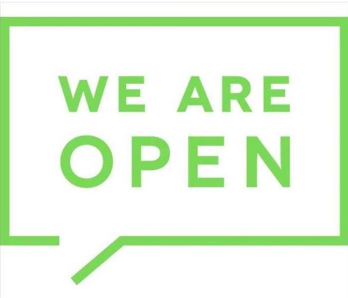 Green "We are open" text